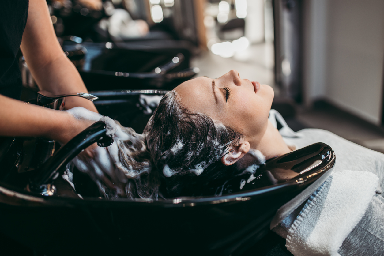 Hair being treated at a salon